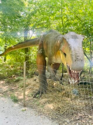 Life-sized animatronic dinosaurs