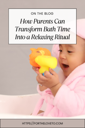 Adorable baby enjoying bath time with fun toys, wearing a cozy pink bathrobe. Discover how parents can transform bath time into a relaxing ritual for babies. Read more at ForTheLoveTo.com!