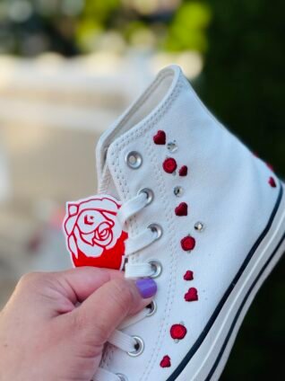 White sneaker decorated using Blinger gems