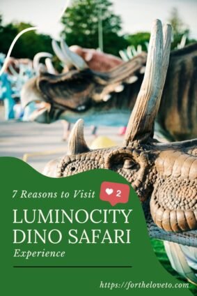A close-up of a triceratops sculpture at LuminoCity Dino Safari Long Island with green banner text reading "7 Reasons to Visit LuminoCity Dino Safari Experience