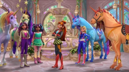 Unicorn Academy main characters standing proudly with their colorful unicorns inside a magical academy — new fantasy adventure series now on Nickelodeon.