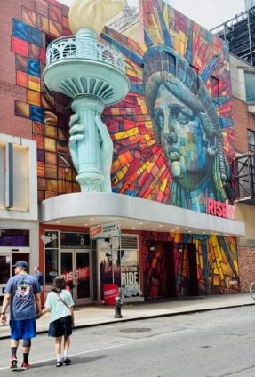 Entrance to RiseNY immersive experience in Times Square, a top family-friendly NYC attraction