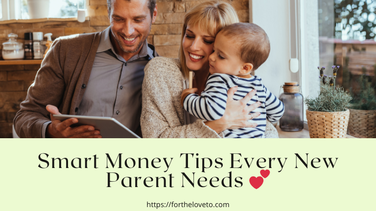 Smiling parents holding baby while looking at a tablet — smart money tips every new parent needs for budgeting, saving, and family finances.