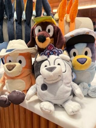 Bluey x CAMP plush toys including Bluey, Bingo, and friends displayed in CAMP shop.