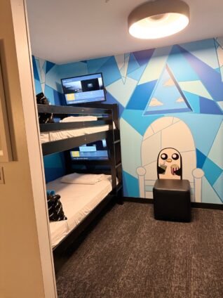 Ice King bunk room with cartoon murals and bunk beds during a Cartoon Network Hotel weekend getaway