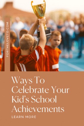 A young boy proudly raises a gold trophy above his head during a school sports event, with teammates and parents cheering in the background. The pin text highlights “Ways to Celebrate Your Kid’s School Achievements.