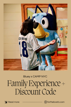 A child meets Bluey at CAMP NYC during the immersive family experience. Learn how to save $10 on tickets with discount code FORTHELOVETO.