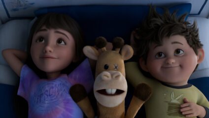 Scene from Netflix’s animated film In Your Dreams showing two kids lying in bed with their stuffed toy, featured in a Netflix Kids and Family Holiday movie guide.