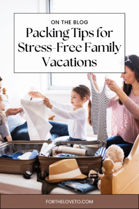 Parents and kids folding clothes together and packing a suitcase on the bed — a warm family moment showing packing tips for stress-free family vacations.