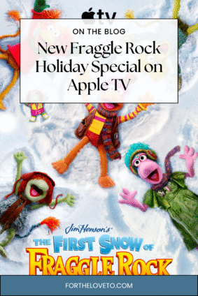 Fraggles playing in the snow with the Apple TV logo, highlighting the new holiday special The First Snow of Fraggle Rock premiering this season.