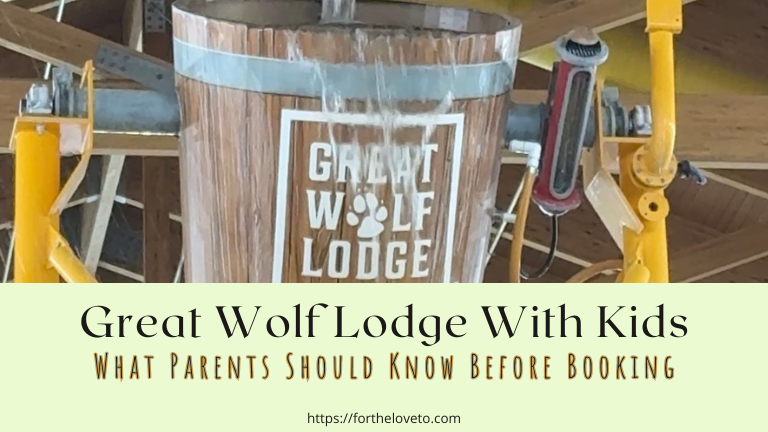 Large Great Wolf Lodge tipping bucket inside the indoor water park, captured during our family visit. Perfect visual for parents planning a Great Wolf Lodge trip with kids and looking for real tips before booking.