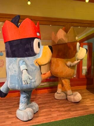 Bluey and Bingo characters at the Holiday Bluey x CAMP NYC experience