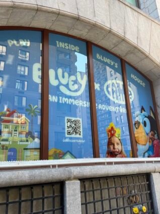 Holiday Bluey x CAMP NYC exterior inviting families to play inside Bluey’s house