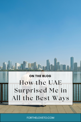 Personal UAE travel experience with waterfront skyline and city view at sunset