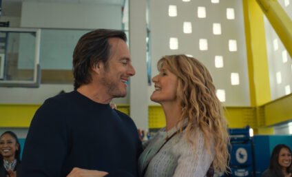 Will Arnett and Laura Dern smiling together in a scene from the Is This Thing On movie streaming on Hulu.