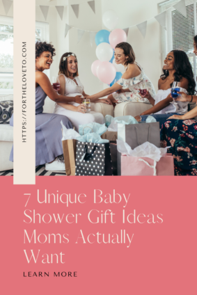 friends gathered at a baby shower opening gifts and celebrating, representing unique baby shower gift ideas moms actually want and will use