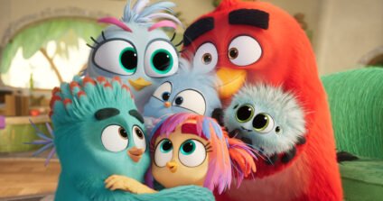 Red and his family share a heartwarming moment in The Angry Birds Movie 3, showcasing the film's new parenthood storyline.