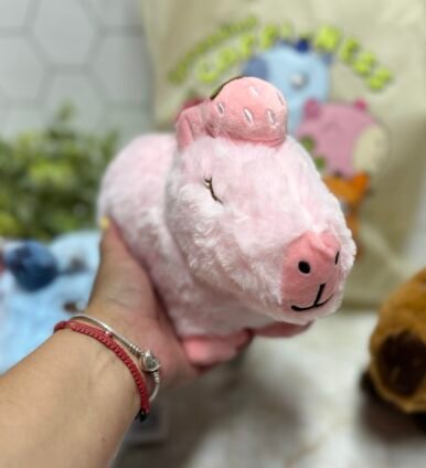 Soft Strawberry Capybara plush from Capy-Era, one of the best capybara gifts for kids, plush collectors, and animal lovers.