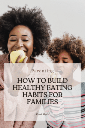 Mother and child enjoying apples together while building healthy eating habits for families.