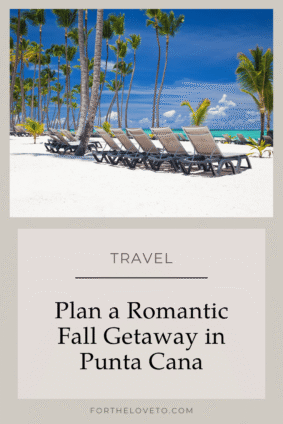 Romantic fall getaway in Punta Cana featuring white sand, turquoise water, palm trees, and beach lounge chairs.