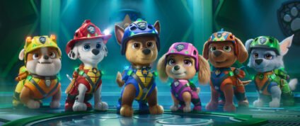 Rubble, Marshall, Chase, Skye, Zuma, and Rocky wearing rescue gear in PAW Patrol: The Dino Movie.